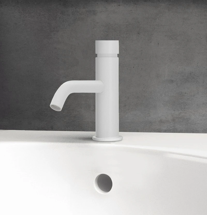 De tekst "Waterevolution Flow Fonteinkraan zelfsluitend mat wit T110TPBR" vertaalt naar het Grieks als "Βρύση Νεροεξέλιξης Flow με αυτόματο κλείσιμο ματ λευκό T110TPBR".